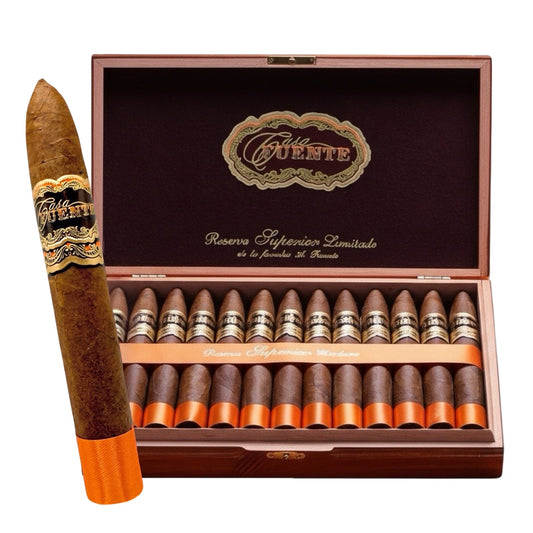 Cigar box with cigars and a single cigar in front on a white background