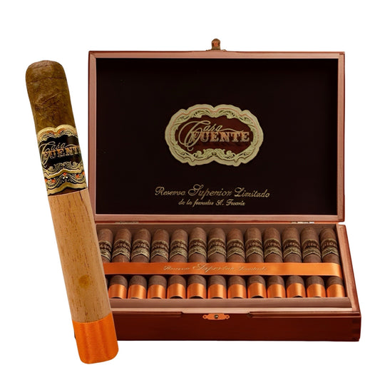 Cuban cigars with Fuente branding in an open wooden box on a white background