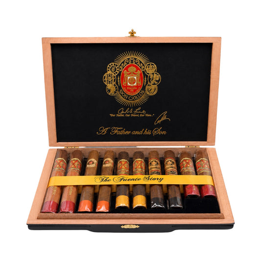 Open wooden box of cigars with a decorative emblem on a white background