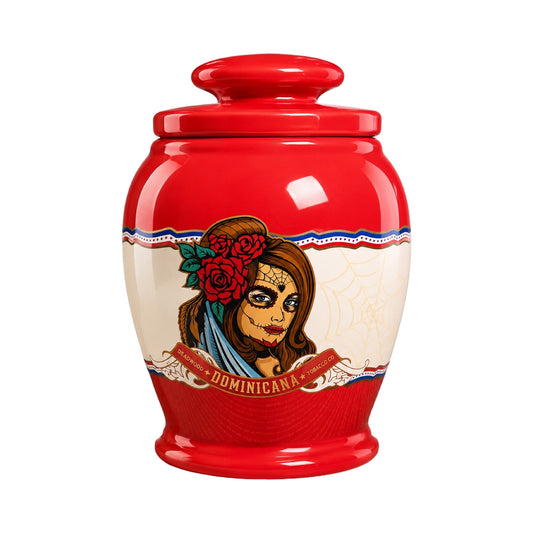 Red urn with a decorative design of a woman's face on a white background