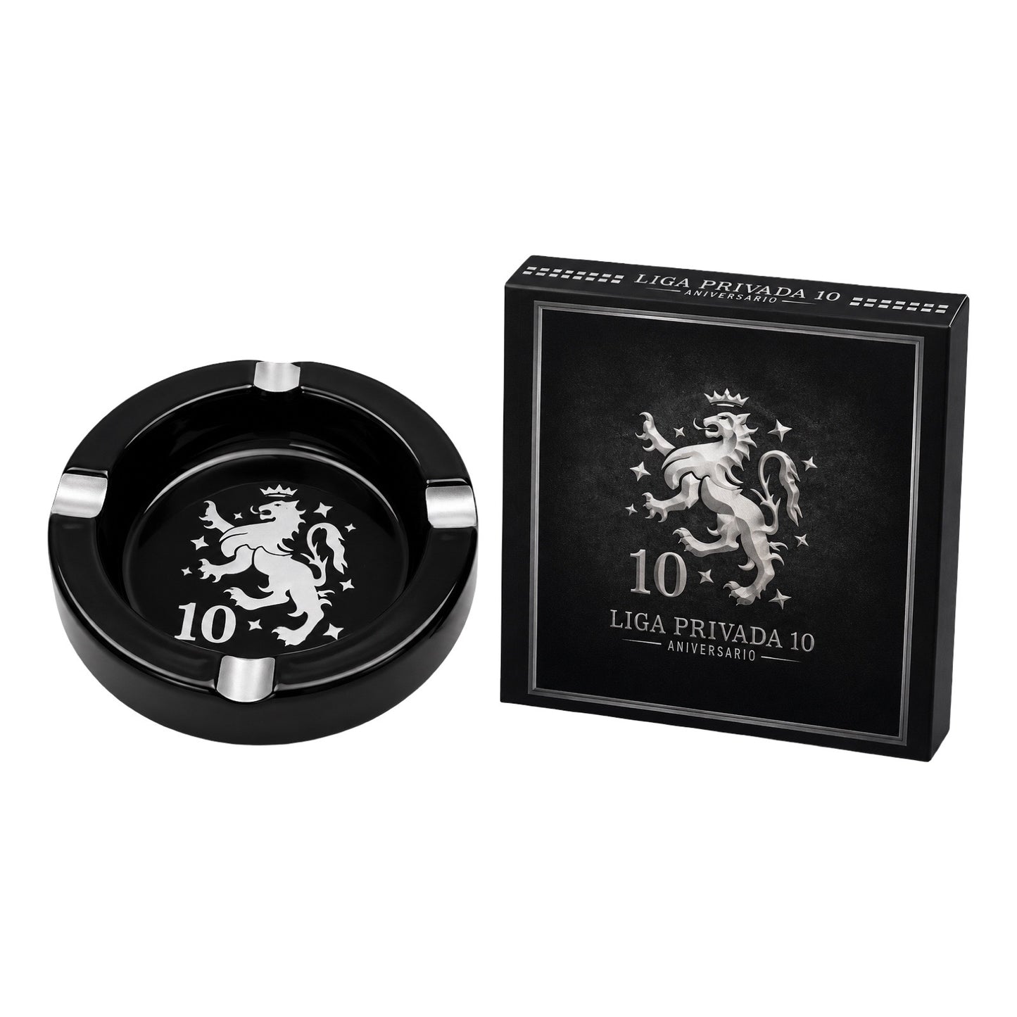 Black ashtray with silver lion design and matching box on a white background