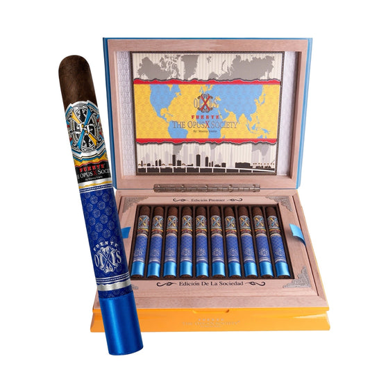 Cigar box with cigars and a single cigar in front on a white background